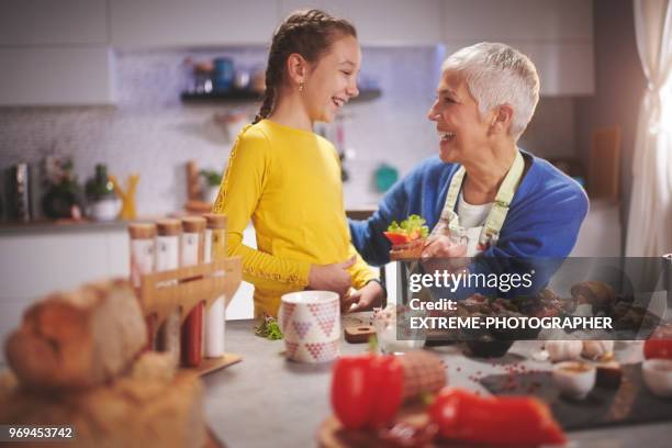 family in the kitchen - extreme dieting stock pictures, royalty-free photos & images