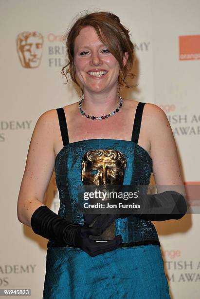 Emma Lazenby poses with the award for Best Short Animation for Mother of Many during the Orange British Academy Film Awards 2010 at the Royal Opera...