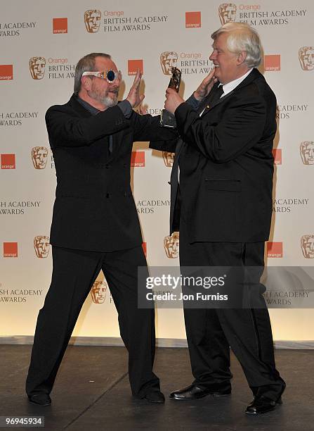 Director Terry Gilliam and Joe Dunton with his Outstanding Contribution to Cinema award during the Orange British Academy Film Awards 2010 at the...