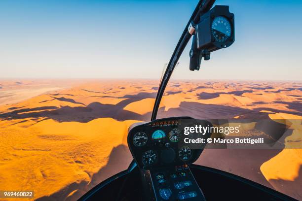 sossusvlei sand dunes seen from helicopter cockpit, namibia - aeroplane part stock pictures, royalty-free photos & images