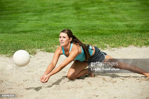 beach volleyball - young woman - volleyball park stock pictures, royalty-free photos & images