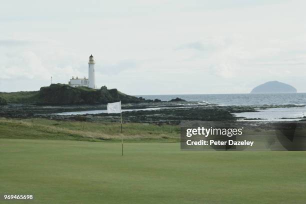 Shot of the 10th green at Turnberry golf club in Ayrshire Scotland with the lighthouse and Ailsa Craig in the distance, 2013