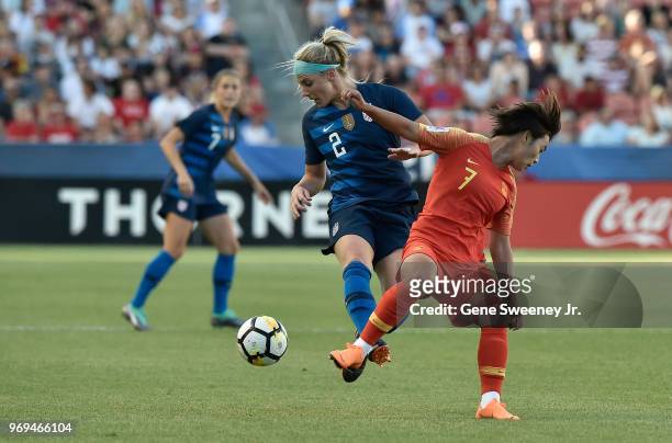 Julie Ertz of the United States steals the ball from Wang Shuang of China in the first half of an international friendly soccer match at Rio Tinto...