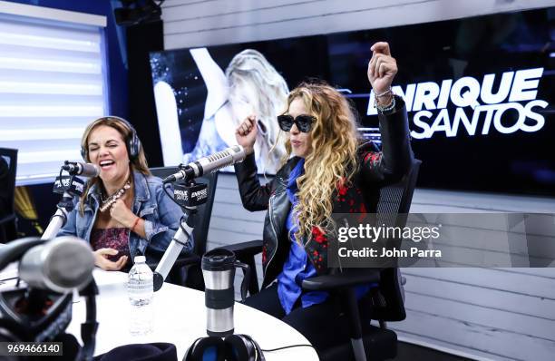 Gina Ulmos and Paulina Rubio attend the I Heart Latino Studio Enrique Santos Show on June 7, 2018 in Miramar, Florida.