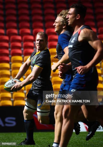 Australia's David Pocock attends the captain's run training session at Suncorp Stadium in Brisbane on June 8 ahead of the rugby match between...