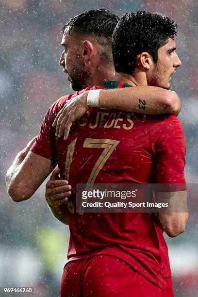 Bruno Fernandes of Portugal hugs Gonçalo Guedes of Portugal during the friendly match of preparation for FIFA 2018 World Cup between Portugal and...