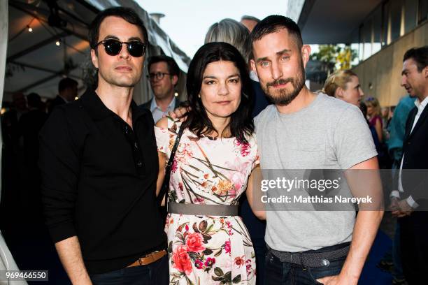 Nikolai Kinski, Jasmin Tabatabai and Clemens Schick attend the Summer Party of the German Producers Alliance on June 7, 2018 in Berlin, Germany.