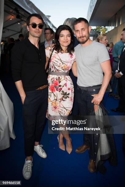 Nikolai Kinski, Jasmin Tabatabai and Clemens Schick attend the Summer Party of the German Producers Alliance on June 7, 2018 in Berlin, Germany.