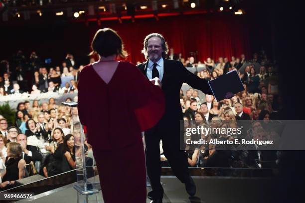 Rachel Morrison accepts the Franklin J. Schaffner award from American Film Institute President and CEO Bob Gazzale onstage during the American Film...