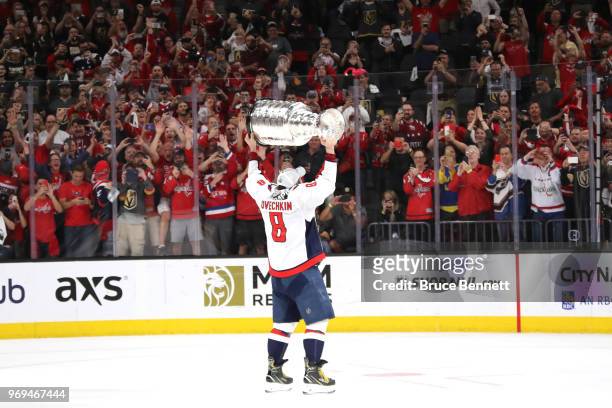 Alex Ovechkin of the Washington Capitals hoists the Stanley Cup after his team defeated the Vegas Golden Knights 4-3 in Game Five of the 2018 NHL...