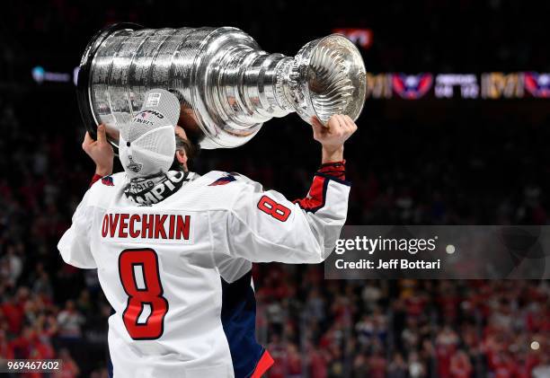 Alex Ovechkin of the Washington Capitals celebrates with the Stanley Cup after defeating the Vegas Golden Knights in Game Five of the Stanley Cup...