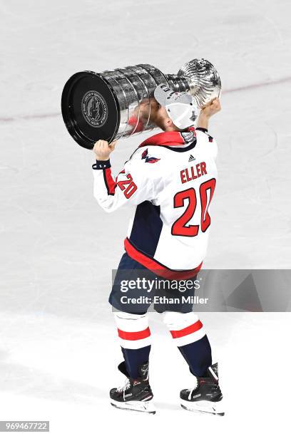 Lars Eller of the Washington Capitals hoists the Stanley Cup after his team's 4-3 win over the Vegas Golden Knights in Game Five of the 2018 NHL...