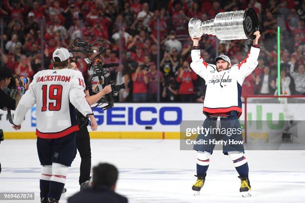 Alex Ovechkin of the Washington Capitals hoists the Stanley Cup after his team defeated the Vegas Golden Knights 4-3 in Game Five of the 2018 NHL...