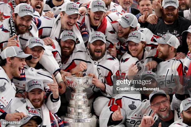 Alex Ovechkin of the Washington Capitals poses with his teammates for the team photo after their 4-3 win over the Vegas Golden Knights to win the...