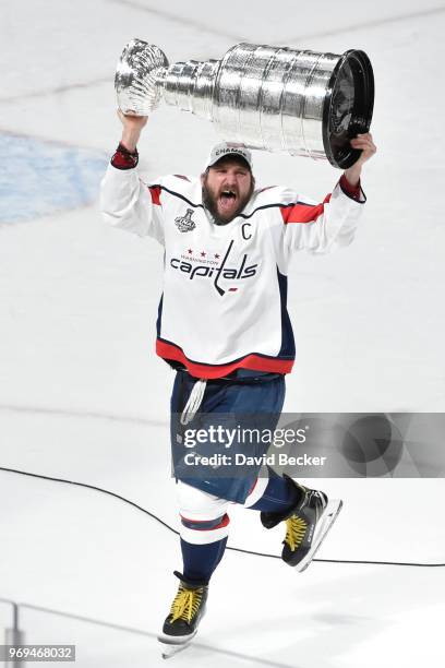 Alex Ovechkin of the Washington Capitals celebrates with the Stanley Cup after defeating the Vegas Golden Knights in Game Five of the Stanley Cup...