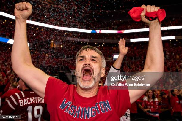 Washington Capitals fan celebrates after the Washington Capitals win Game 5 of the Stanley Cup Final against the Vegas Golden Nights to capture the...