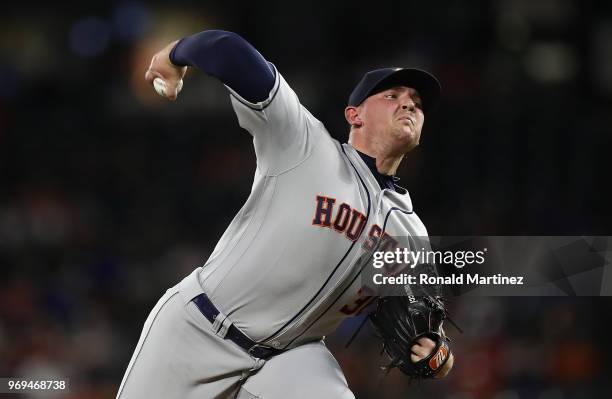 Will Harris of the Houston Astros throws against the Texas Rangers in the seventh inning at Globe Life Park in Arlington on June 7, 2018 in...