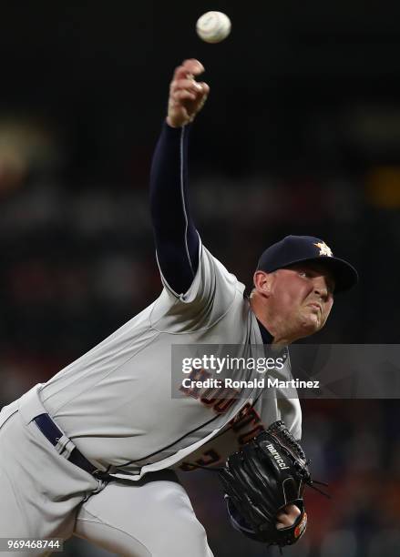 Will Harris of the Houston Astros throws against the Texas Rangers in the seventh inning at Globe Life Park in Arlington on June 7, 2018 in...