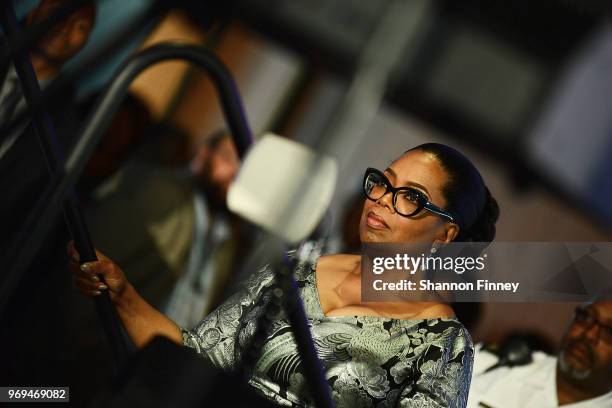 Oprah Winfrey waits to take the stage at the "Watching Oprah: The Oprah Winfrey Show And American Culture" Opening Reception at the National Museum...