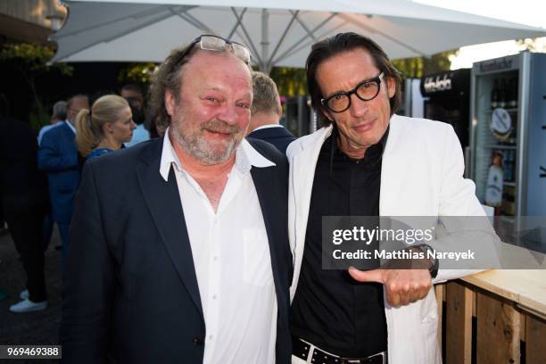 Stefan Arndt and Oskar Roehler attend the Summer Party of the German Producers Alliance on June 7, 2018 in Berlin, Germany.