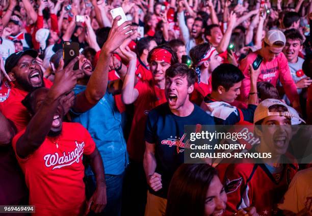 Washington Capitals fans celebrate after the Washington Capitals won Game 5 of the Stanley Cup final against the Vegas Golden Knights to capture the...