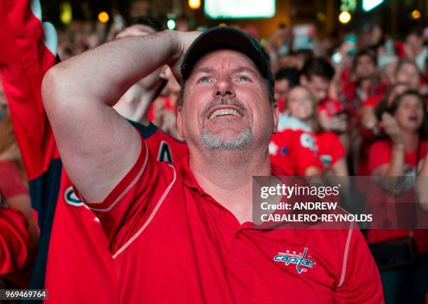 Washington Capitals fans celebrate after the Washington Capitals won Game 5 of the Stanley Cup final against the Vegas Golden Knights to capture the...