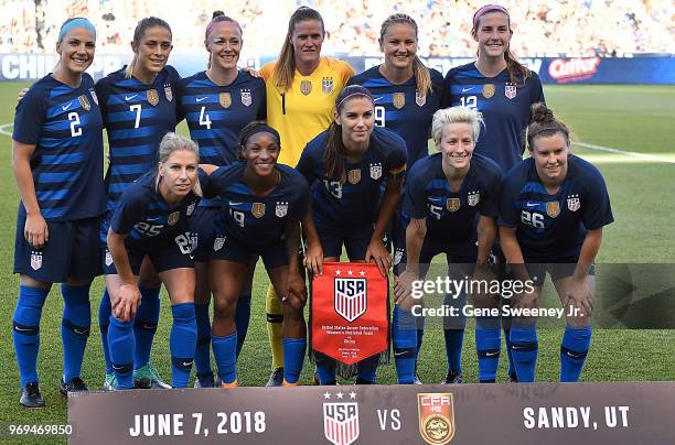 The United States team poses for a photo prior to their match against China in an international friendly soccer match at Rio Tinto Stadium on June 7,...