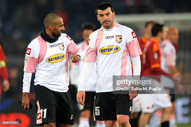 Cesare Bovo of Palermo looks dejected as his team mate Fabio Liverani gestures after loosing the Serie A match between AS Roma and US Citta di...