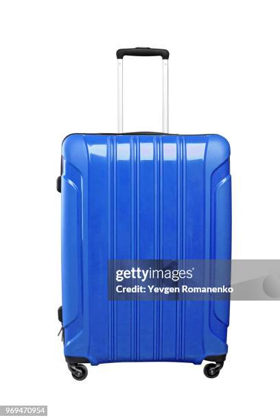 blue travel bag on wheels, isolated on white background. - suitcase close foto e immagini stock