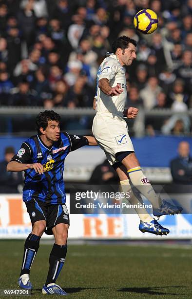 Gyorgy Garics of Atalanta BC competes for the ball with Sergio Pellissier of AC Chievo Verona during the Serie A match between Atalanta BC and AC...