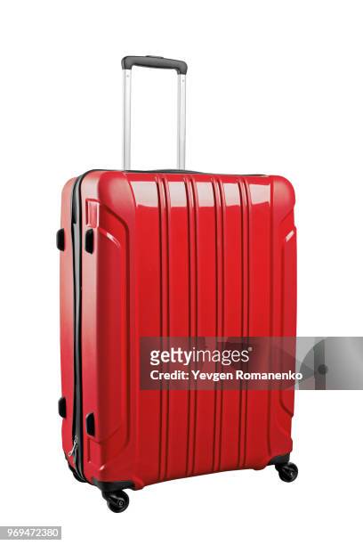 red travel bag isolated on white background. - スーツケース ストックフォトと画像