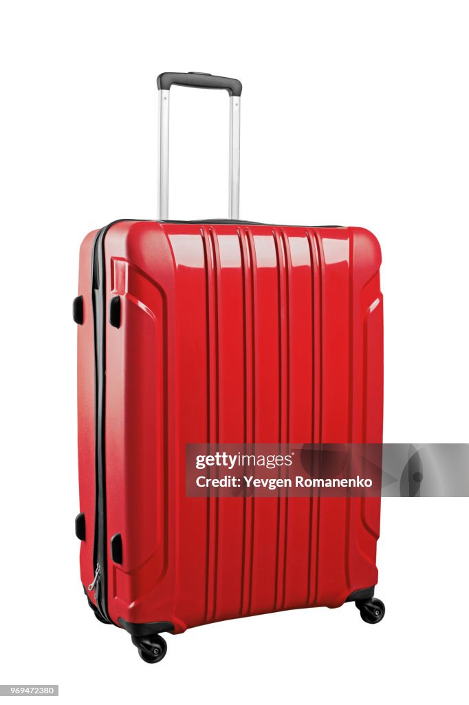 Red travel bag isolated on white background.