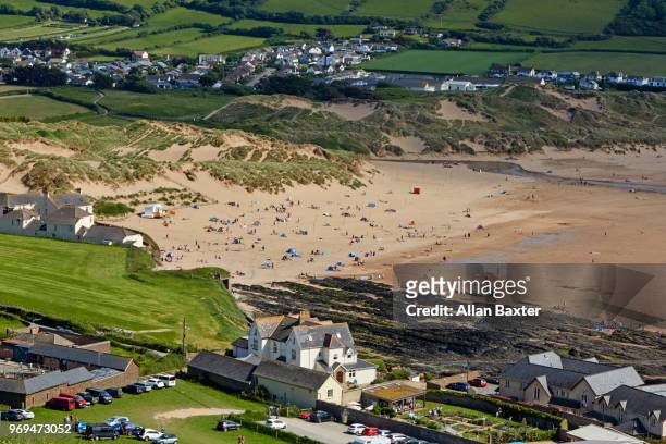 aerial view of the resort town of croyde and croyde beach - croyde beach stock pictures, royalty-free photos & images