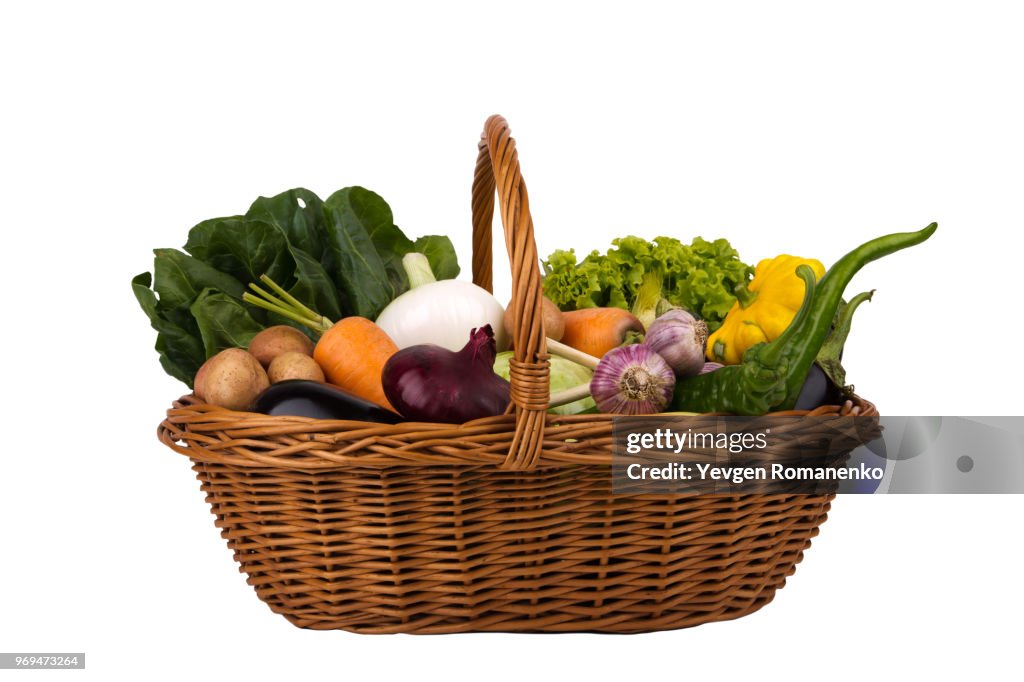 Wicker Basket with vegetables Isolated on a white background