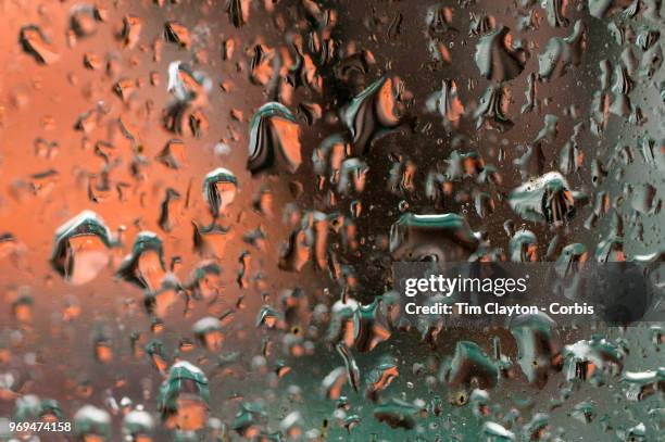 June 4. French Open Tennis Tournament - Day Ten. The covered clay court on Court Philippe-Chatrier refelcted in the rain drops during a rainy day in...