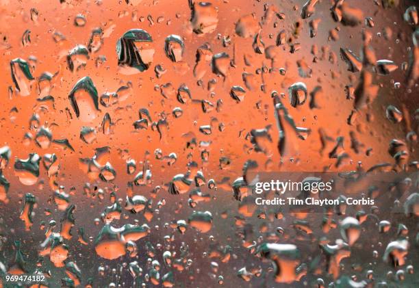 June 4. French Open Tennis Tournament - Day Ten. The covered clay court on Court Philippe-Chatrier refelcted in the rain drops during a rainy day in...