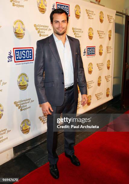 Actor Scott Elrod arrives for the "Tribute To The USO" benefit at Saban Theatre on February 21, 2010 in Beverly Hills, California.