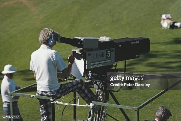 Shot of a CBS cameraman covering 1983 US Masters at Augusta