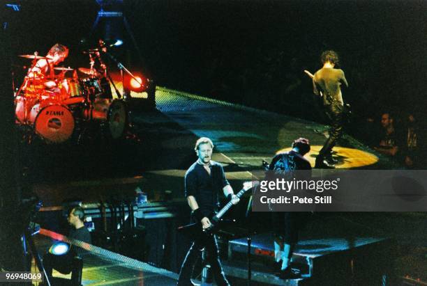 Lars Ulrich, James Hetfield, Jason Newsted and Kirk Hammett of Metallica perform on stage at The Nynex Arena on October 15th, 1996 in Manchester,...