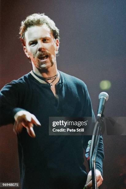 James Hetfield of Metallica performs on stage at The Nynex Arena on October 15th, 1996 in Manchester, England.