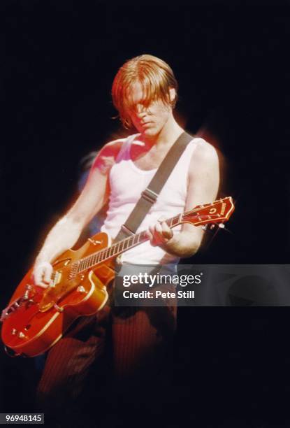 Bryan Adams performs on stage at The National Exhibition Centre on April 4th, 1997 in Birmingham, England.