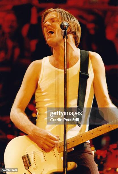 Bryan Adams performs on stage at The National Exhibition Centre on April 4th, 1997 in Birmingham, England.