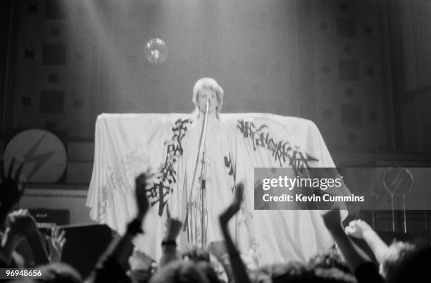 English singer David Bowie performs on stage at Free Trade Hall in Manchester as part of the Ziggy Stardust / Aladdin Sane tour on June 07, 1973.