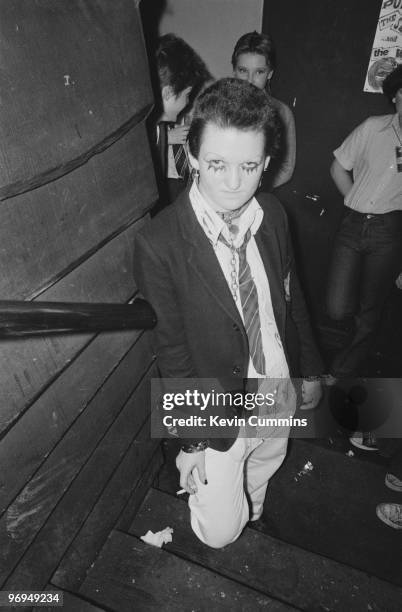 Female fan of English punk band the Buzzcocks, wearing chains, at the Ranch Club in Manchester, England on July 22, 1977.