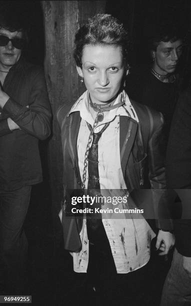 Female fan of English punk band the Buzzcocks, wearing chains, at the Ranch Club in Manchester, England on July 22, 1977.