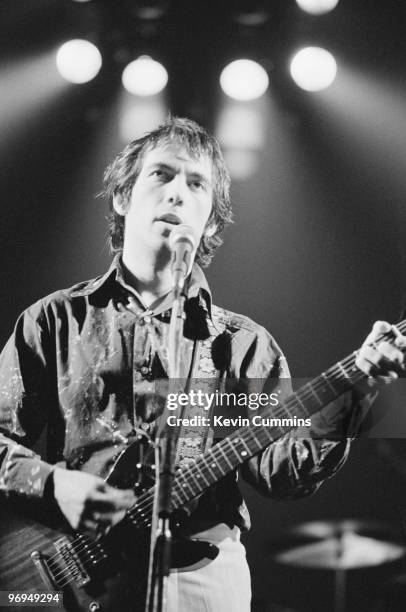Singer Pete Shelley of English punk band the Buzzcocks performs on stage at the Apollo Theatre in Manchester, England on November 12, 1978.