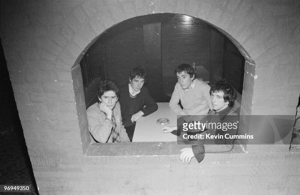 Bassist Steve Garvey, guitarist Steve Diggle, drummer John Maher and singer Pete Shelley of English punk band the Buzzcocks backstage at Eric's in...