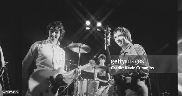 Guitarist Steve Diggle, drummer John Maher and singer Pete Shelley of English punk band the Buzzcocks on stage during rehearsal at the Middleton...