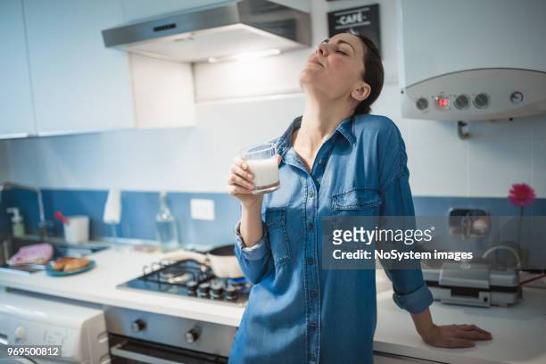young women having breakfast, drinking milk - no drinking stock pictures, royalty-free photos & images
