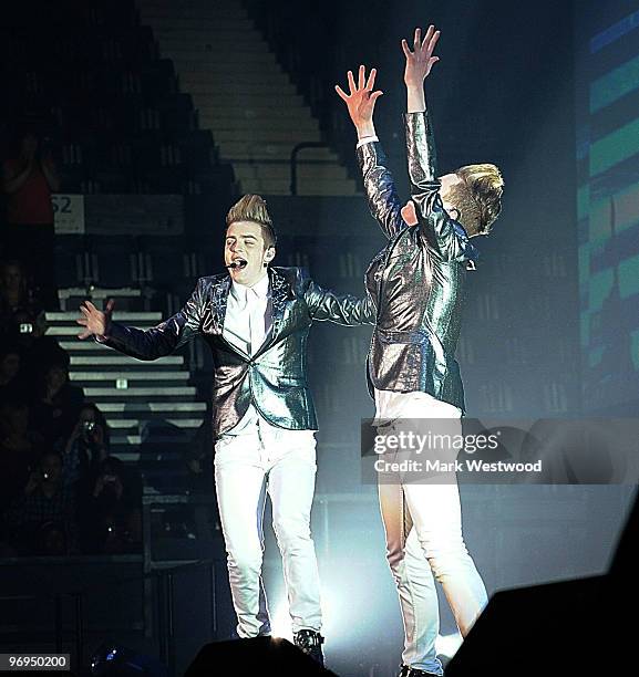 Jedward perform on stage at Wembley Arena on February 21, 2010 in London, England.